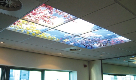 Photographs are printed on to backlit polycarbonate tiles.