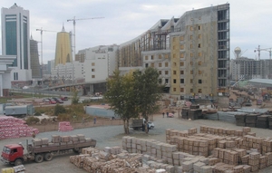 Construction work in Astana. The Tree of Life is visible at the far right of the image.