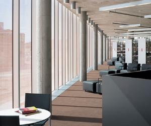 The copper expanded mesh held between the triple glazing allows views out while obviating the need for blinds.