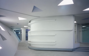 View from the flexible space. The curved wall will support the centre's library of cancer relate ...