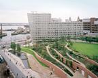 The new 2.2ha Chavasse Park sits atop a car park and is dominated by an apartment building by Pelli Clarke Pelli with Brock Carmichael.