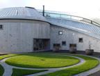 The exterior is set inset with hundreds of triangular titanium plates