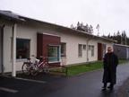 Hans Eek in front of a new Passivhaus primary school