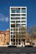 The building presents its branded frontage to Euston Road.