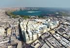 Looking across the man-made corniche to West Bay in the distance.