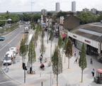 New hard landscaping to the south of the A206. The change of paving surface indicates the original line of the arsenal’s wall.