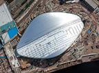 The partly complete wave-like roof of Zaha Hadid’s Olympic Aquatics Centre.