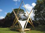 The 9m-tall pavilion in Park Crescent sits on four steel trays weighted with concrete slabs.