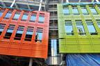 The bright facades facing Bucknall Street. 