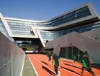 A 100m race track cuts across the plan linking the two site entrances.