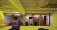 The mesh brings new light into the basement cafeteria and meeting space