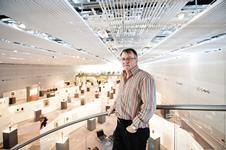 Stephen Hodder on the high-level walkway over-looking the gallery space.