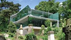 The three-storey home overlooks Highgate Cemetery.
