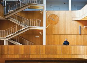 Tim Ronalds pictured in the hall of the law court extension beneath the “festive” illuminated clock.