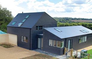 Marley Eternit’s Thrutone fibre cement slates were chosen by BBLB to provide a uniform finish for the roof and walls of a private house in West Sussex.