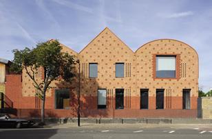 The building’s principal facade references its neighbour.