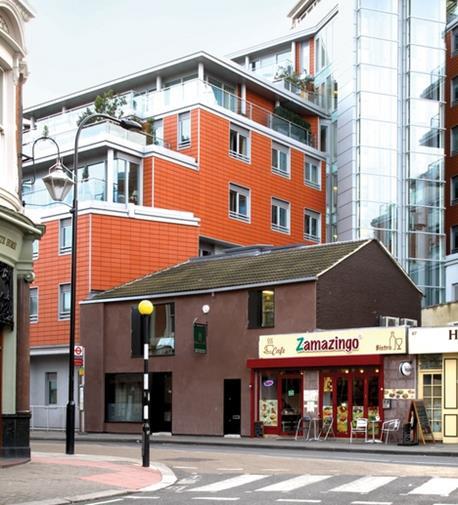 Access to the restaurant, on a site next to a large block of flats, is constrained by the narrow pavement and busy one-way system.