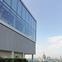 The top of the cube is given over to a roof garden, watched over from by the tilted window of the Sky Pavilion.