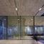 walls are lined with bronze, brass and champagne-anodised aluminium
