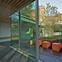 The blocks are in an interlocking circle around a planted courtyard