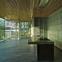 The south-facing kitchen is framed by a cast resin storage wall by Vincent de Rijk.