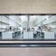The laboratories are flooded with natural light from curvaceous light wells that seem to mimic scientific flasks.