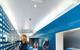 Blue MDF laminate for the cupboards, right, and the solid laminate glasses display, left.